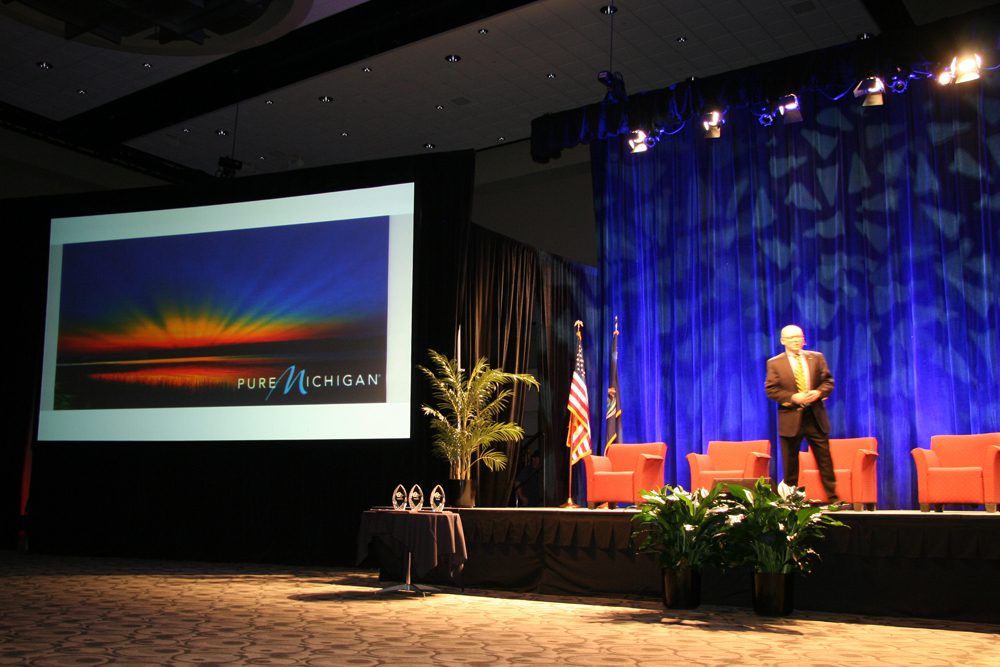 Jeff DeGraff delivers the keynote address at a recent conference organized by Governor Snyder