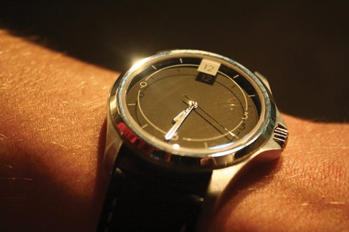 watch on wrist of designer