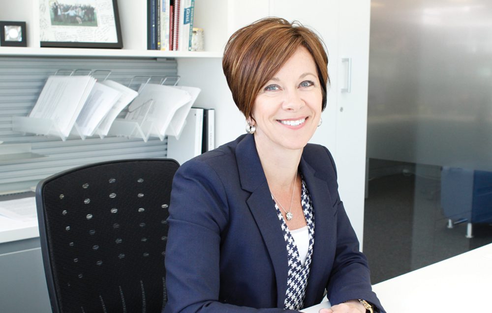 Leesa Smith heads the North American headquarters for one of the world’s largest  suppliers to the automotive industry.  photo by dan jackson