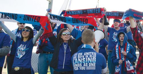 Fans of Lansing United, a member of the National Premier Soccer League, call themselves “Sons of Ransom”— a reference to Ransom Olds, founder of Oldsmobile and a native of Lansing. Photo by Michele Hoffman