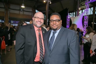 Gerry Brisson (Gleaners President) and Omari Taylor of Neighborhood Service Organization 