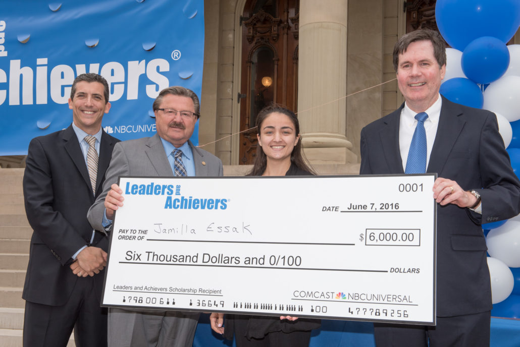 Jamilla Essak of Sterling Heights (Regina H.S.) was awarded an additional $6,000 Comcast Founders Scholarship. Pictured with Essak are Craig D’Agostini (Vice President of Government and Regulatory Affairs, Comcast), Senator Mike Kowall, R-White Lake, and Tim Collins (Senior Vice President, Comcast).