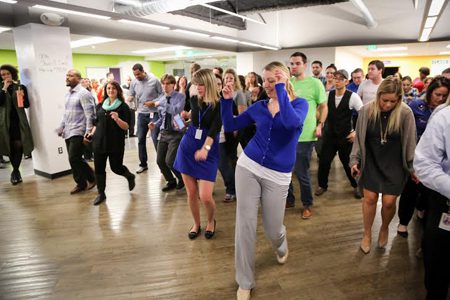 United Shore team members participate in a 3 o’clock dance party, a weekly event that’s become a popular part of the company’s culture.