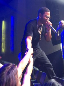 Nelly high-fives United Shore team members during his performance (credit: Quiana Broden)