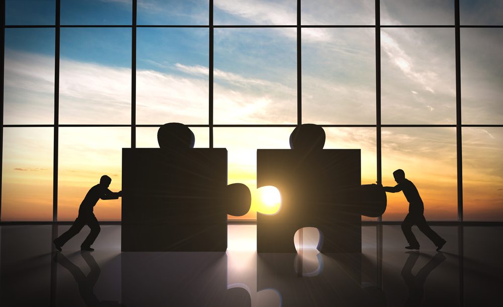 Business teamwork puzzle pieces