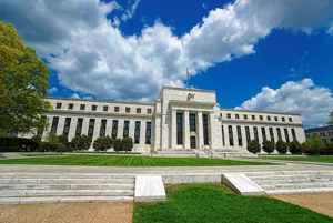 Fed Hikes Interest Rate, Hints at Pause